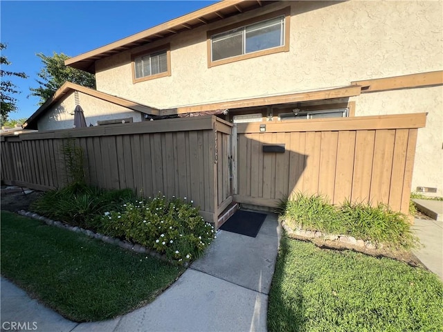 17760 Palo Verde Ave Unit 27, Cerritos, CA 90703 - exterior space featuring stucco siding and fence