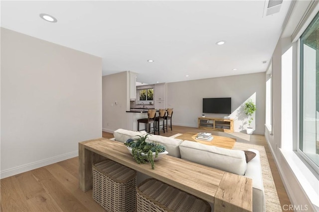 23625 Summit Dr, Calabasas, CA 91302 - living area with recessed lighting, light wood-type flooring, visible vents, and baseboards