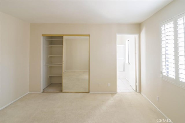 23625 Summit Dr, Calabasas, CA 91302 - unfurnished bedroom featuring baseboards, ensuite bath, a closet, and carpet