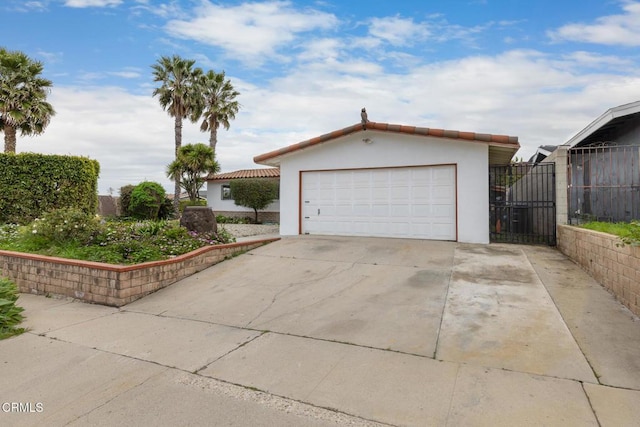 garage with driveway