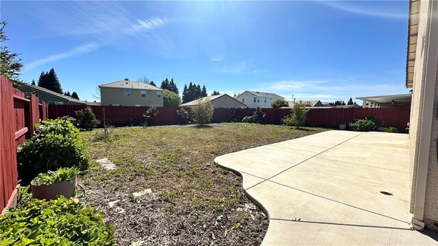 2428 Freestone Dr, Merced, CA 95340 - fenced backyard with a patio