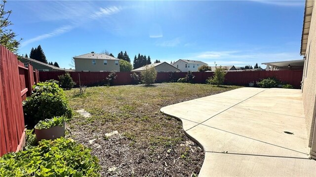 2428 Freestone Dr, Merced, CA 95340 - fenced backyard with a patio