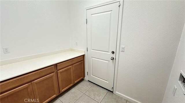 2428 Freestone Dr, Merced, CA 95340 - entryway with light tile patterned floors