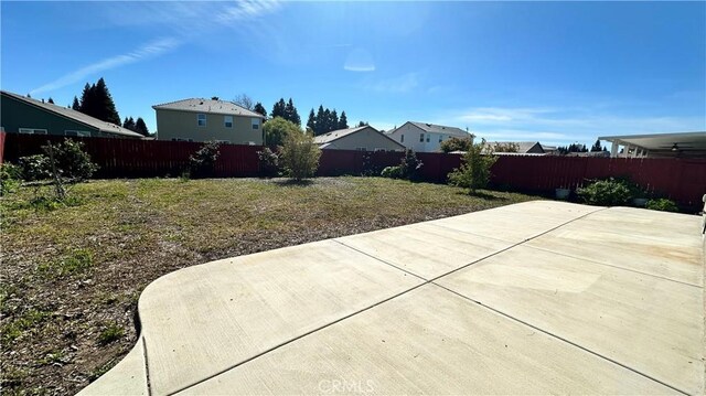 2428 Freestone Dr, Merced, CA 95340 - fenced backyard featuring a patio area and a residential view