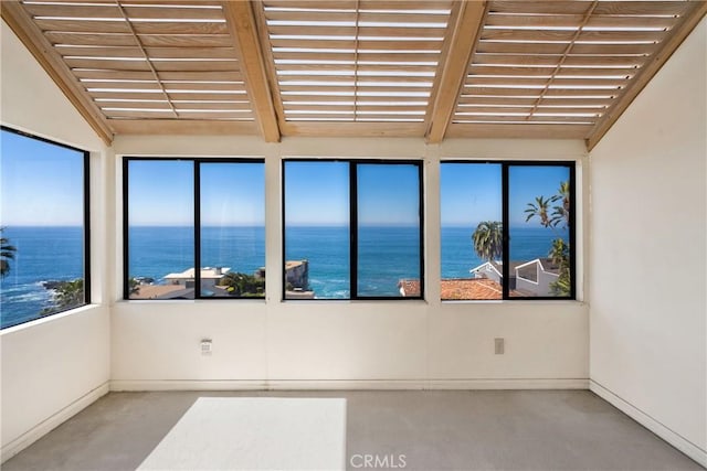 31706 Seacliff Dr, Laguna Beach, CA 92651 - unfurnished sunroom featuring beam ceiling and a water view