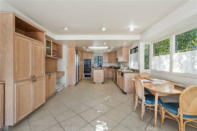 31706 Seacliff Dr, Laguna Beach, CA 92651 - kitchen featuring light brown cabinets, a healthy amount of sunlight, open shelves, and light tile patterned floors