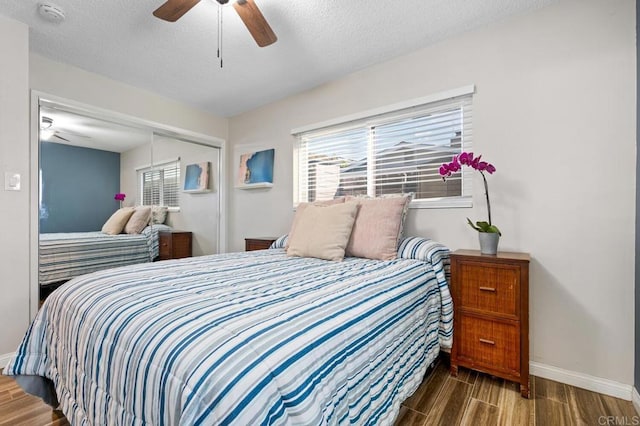 2722 Penkea Dr, Oceanside, CA 92054 - bedroom featuring wood finished floors, baseboards, a closet, a textured ceiling, and ceiling fan