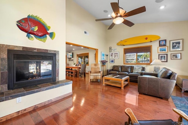 2722 Penkea Dr, Oceanside, CA 92054 - living room with wood finished floors, a fireplace, ceiling fan, recessed lighting, and vaulted ceiling