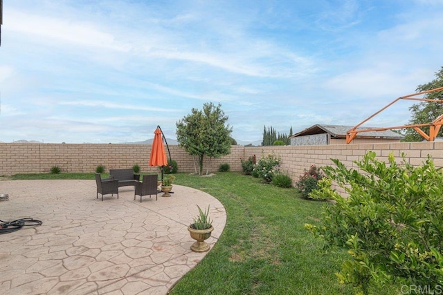 400 Colt St, San Jacinto, CA 92582 - fenced backyard featuring a patio area