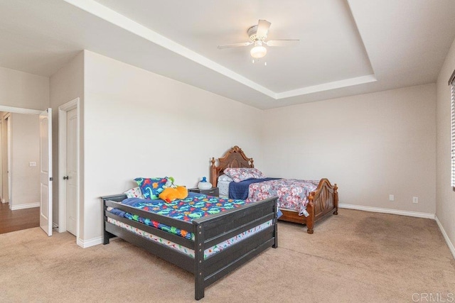 400 Colt St, San Jacinto, CA 92582 - bedroom with carpet floors, a raised ceiling, and a ceiling fan