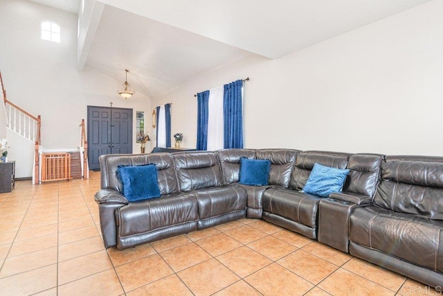 400 Colt St, San Jacinto, CA 92582 - living area with light tile patterned floors, beamed ceiling, stairs, and high vaulted ceiling