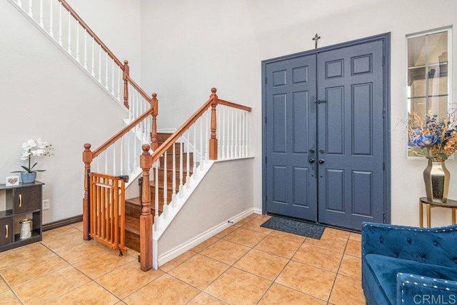 400 Colt St, San Jacinto, CA 92582 - foyer with light tile patterned flooring and stairway
