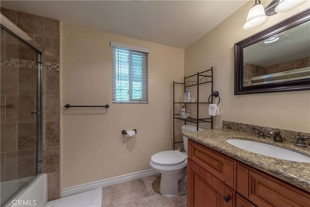 1516 W 5th St, San Pedro, CA 90732 - full bath featuring vanity, tile patterned floors, and enclosed tub / shower combo