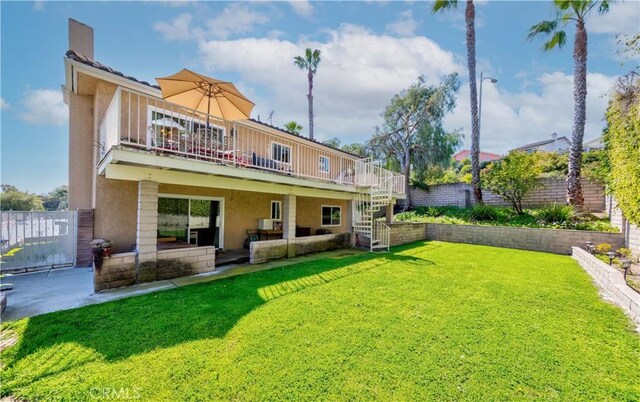 1516 W 5th St, San Pedro, CA 90732 - rear view of house featuring stucco siding, a fenced backyard, stairs, a chimney, and a wooden deck