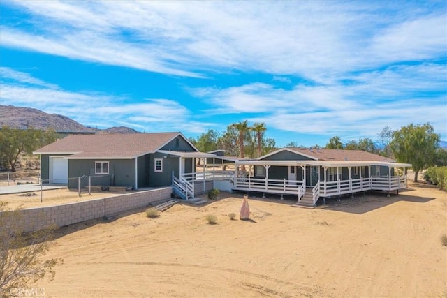 view of front of home with a mountain view