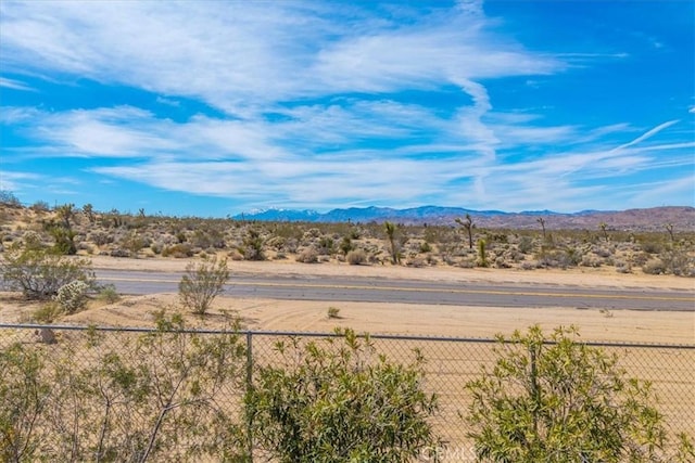 property view of mountains featuring a desert view