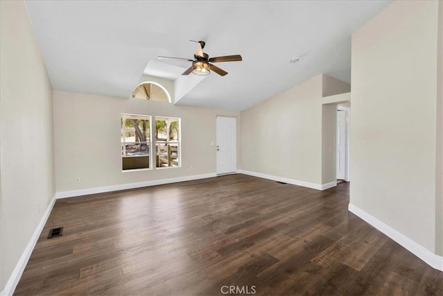empty room featuring baseboards, visible vents, wood finished floors, and ceiling fan
