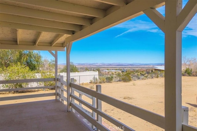 view of patio / terrace featuring a mountain view