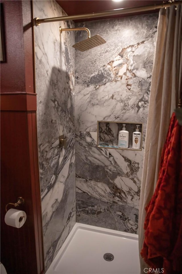 bathroom featuring a stall shower