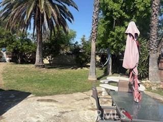 9394 Kempster Ave, Fontana, CA 92335 - view of yard featuring a patio area