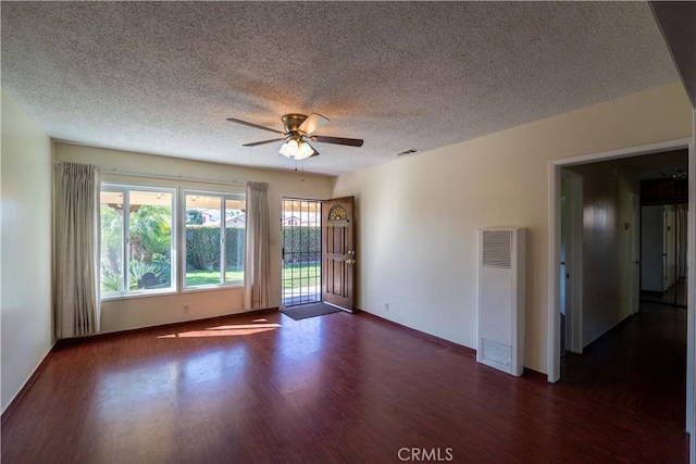 12821 Salisbury St, Baldwin Park, CA 91706 - empty room featuring visible vents, ceiling fan, wood finished floors, and a textured ceiling