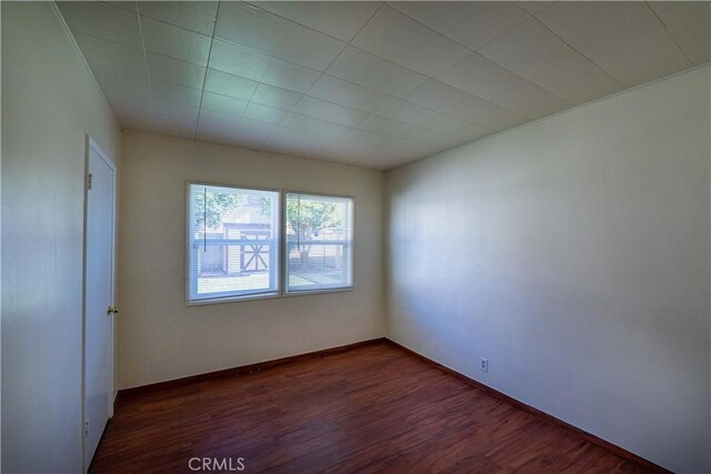 12821 Salisbury St, Baldwin Park, CA 91706 - unfurnished room featuring dark wood-type flooring