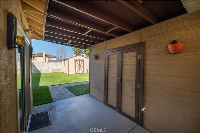 12821 Salisbury St, Baldwin Park, CA 91706 - view of patio / terrace with an outbuilding, fence, and a storage shed