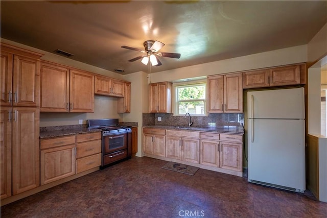 12821 Salisbury St, Baldwin Park, CA 91706 - kitchen featuring freestanding refrigerator, a ceiling fan, visible vents, stainless steel gas range, and a sink