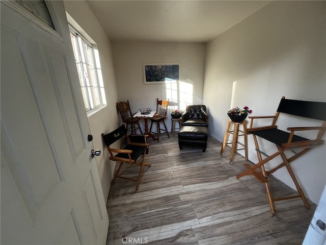 sitting room featuring wood finished floors