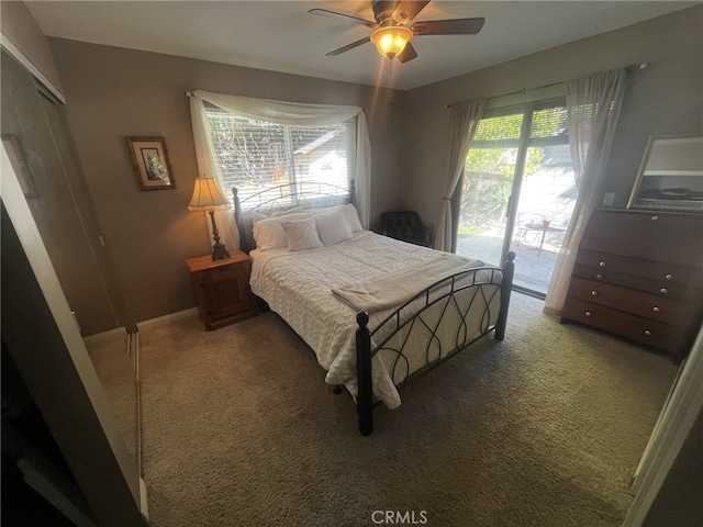 bedroom with baseboards, ceiling fan, carpet, and access to exterior