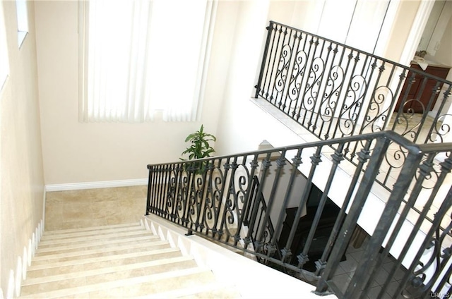 12219 S Main St, Los Angeles, CA 90061 - stairs with tile patterned flooring and baseboards