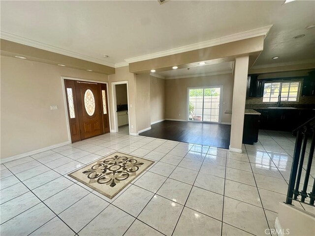12219 S Main St, Los Angeles, CA 90061 - foyer entrance with light tile patterned floors, ornamental molding, and recessed lighting