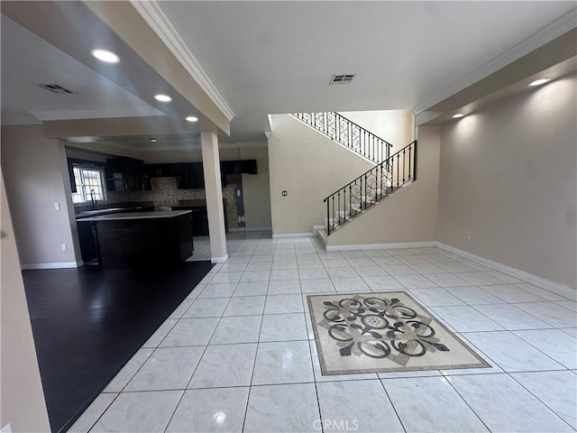 12219 S Main St, Los Angeles, CA 90061 - foyer entrance with ornamental molding, stairs, recessed lighting, and light tile patterned floors
