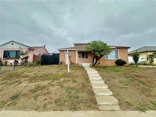 12219 S Main St, Los Angeles, CA 90061 - bungalow-style home with stucco siding
