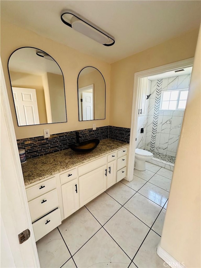 12219 S Main St, Los Angeles, CA 90061 - bathroom featuring a shower stall, vanity, and tile patterned flooring