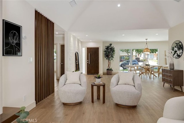 5306 Maricopa St, Torrance, CA 90503 - living room with lofted ceiling, light wood finished floors, and recessed lighting