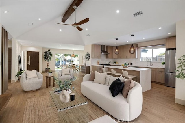 5306 Maricopa St, Torrance, CA 90503 - living area with light wood-style floors, beam ceiling, recessed lighting, plenty of natural light, and ceiling fan