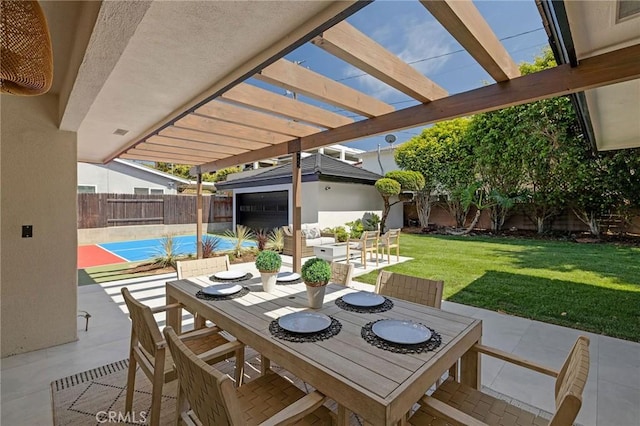 5306 Maricopa St, Torrance, CA 90503 - fenced backyard featuring an outbuilding, outdoor dining area, a pergola, and a patio area