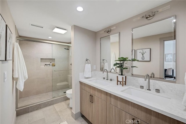 5306 Maricopa St, Torrance, CA 90503 - bathroom with double vanity, a stall shower, recessed lighting, and tile patterned flooring