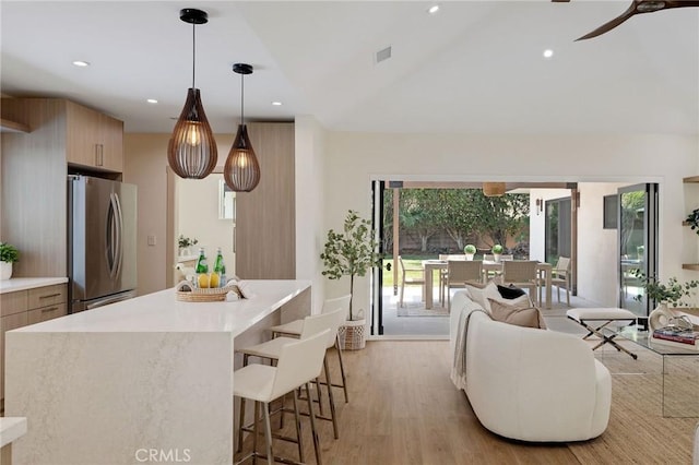 5306 Maricopa St, Torrance, CA 90503 - living area featuring healthy amount of natural light, light wood-style flooring, ceiling fan, recessed lighting, and lofted ceiling