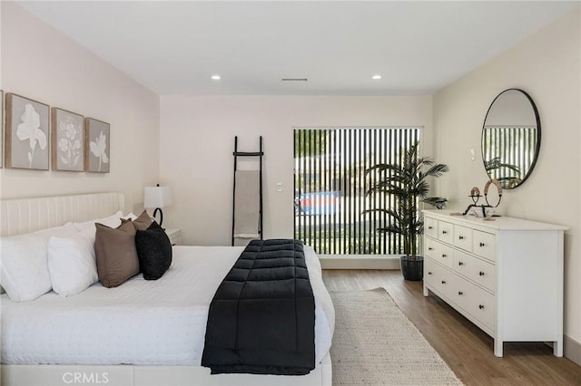 5306 Maricopa St, Torrance, CA 90503 - bedroom with access to exterior, wood finished floors, and recessed lighting