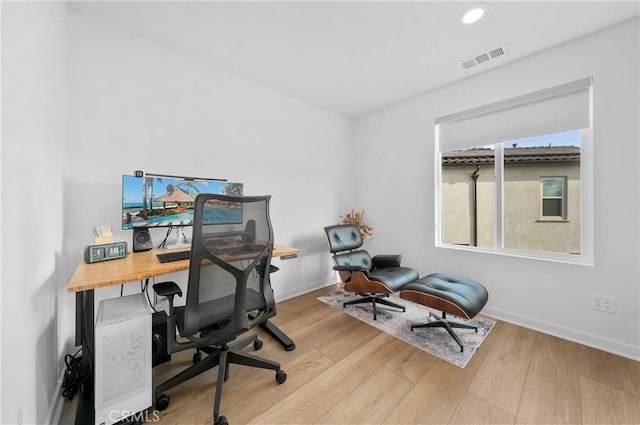office area with baseboards, recessed lighting, visible vents, and wood finished floors