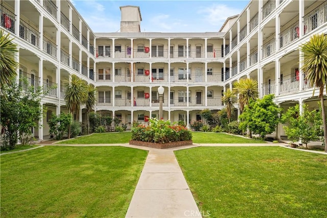 surrounding community featuring a lawn