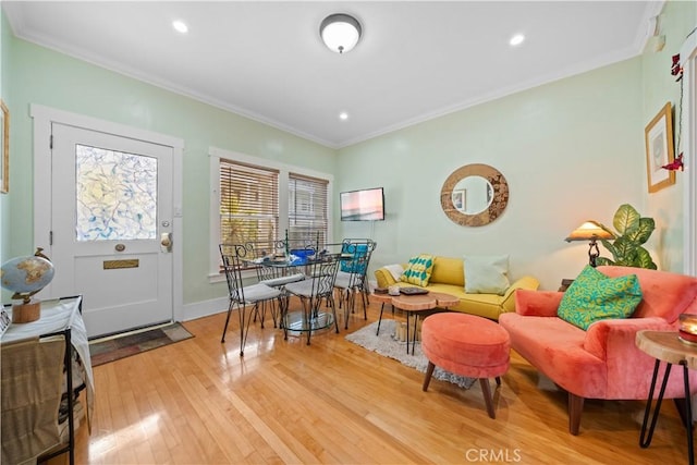 office featuring crown molding, light wood-style floors, and recessed lighting