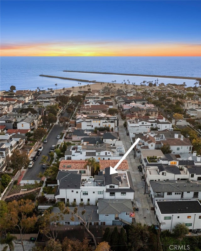 aerial view featuring a water view and a residential view