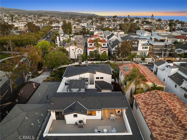 aerial view at dusk with a residential view