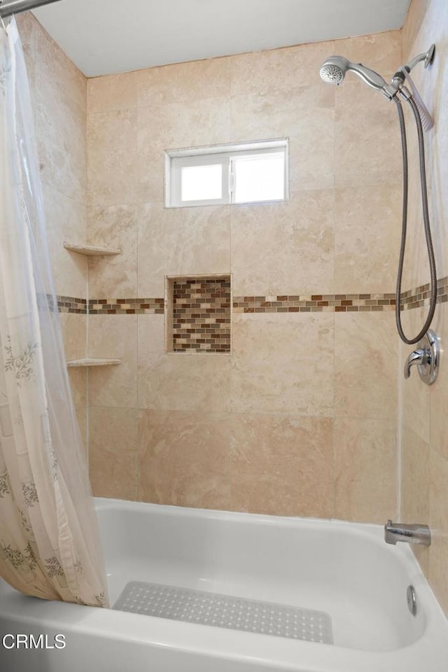 full bathroom with shower / bath combo