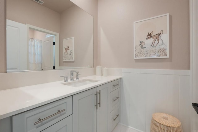 15751 Wainwright Way, San Diego, CA 92127 - full bath featuring vanity and a wainscoted wall