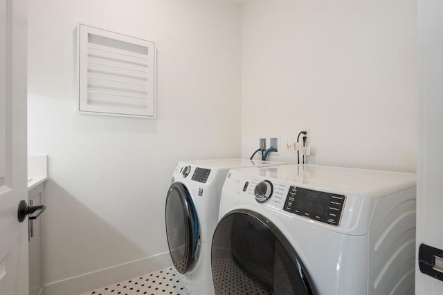 15751 Wainwright Way, San Diego, CA 92127 - washroom with washer and clothes dryer and baseboards