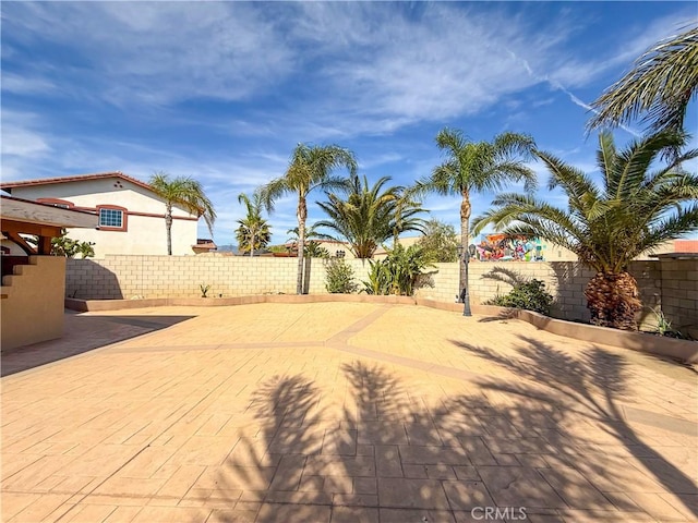 view of patio featuring a fenced backyard